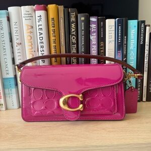 Coach Fuchsia Shoulder Bag with Gold Accent
Perfect size for any occasion